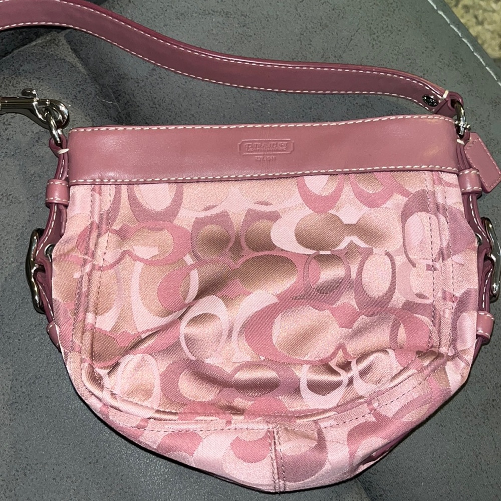 Small new with no tags real authentic Coach purse.